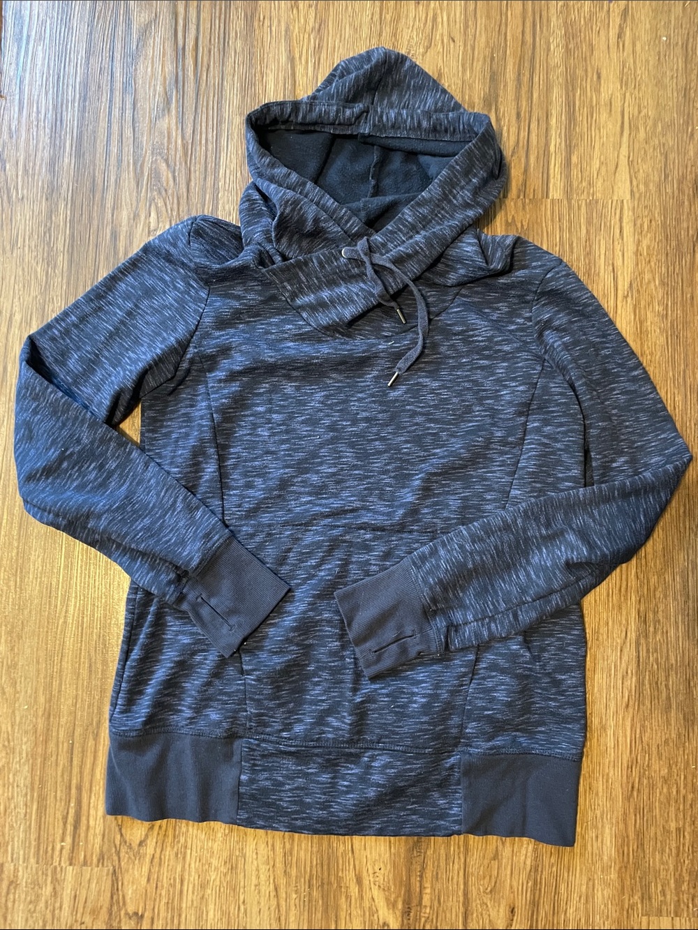 Navy Space-Dye Pullover Hoodie. Thumb holes and kangaroo pocket.
